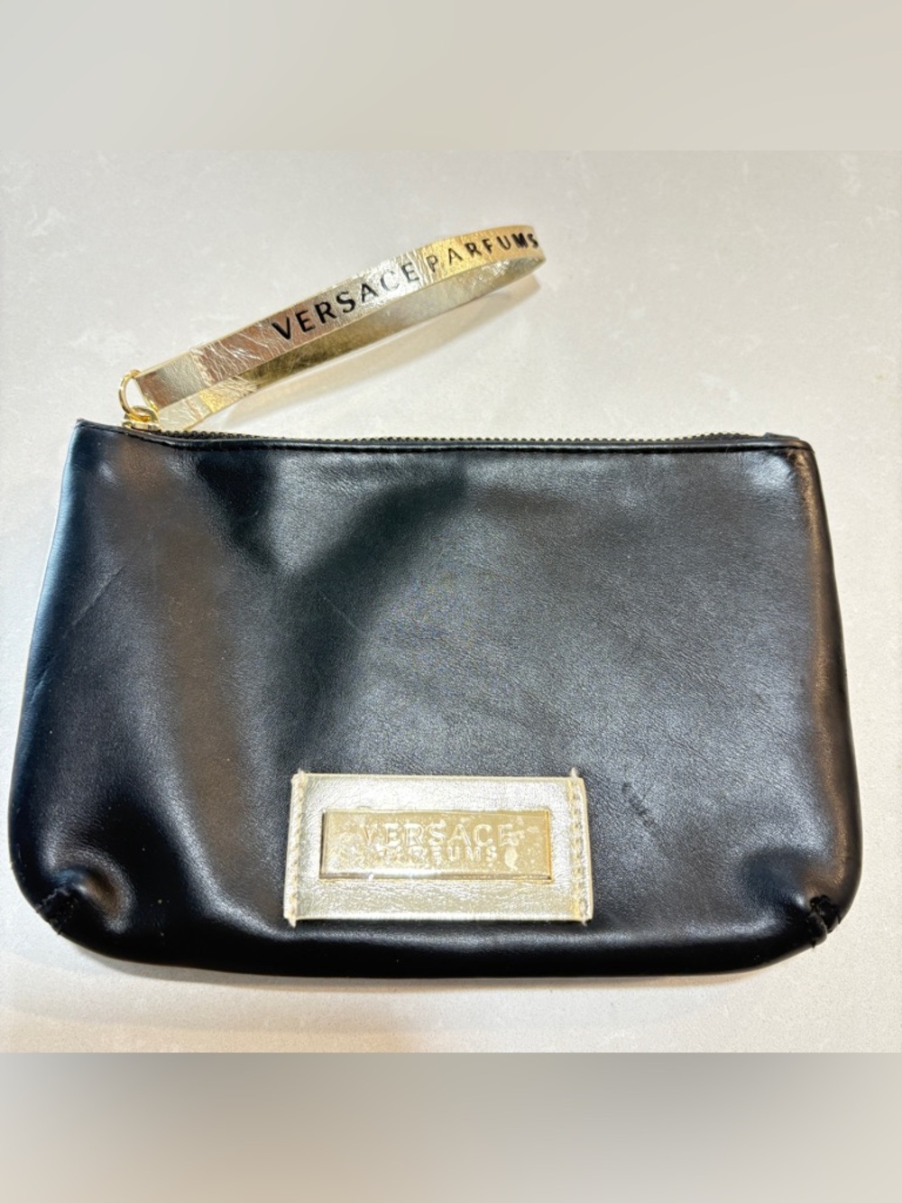 Versace Parfums Black and Gold Pouch Wristlet Mini Bag